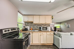 Fridge, microwave, stovetop, coffee/tea maker