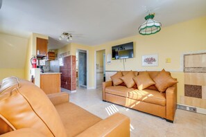 TV, fireplace - Stroll to Shore: Villas Escape w/ Private Patio! (Villas)