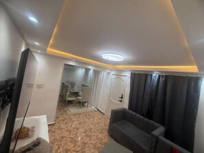 Living area - Apt. acolhedor+Jacuzzi+AC+TV+Cozinha @Santo Domingo RD (Santo Domingo)