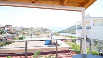 Deluxe Triple Room, Balcony, Lake View | Property grounds