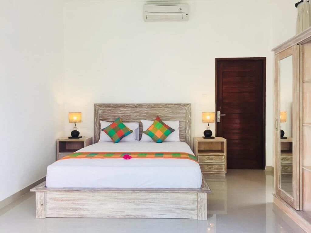 Habitación Deluxe con 1 cama matrimonial o 2 individuales, balcón, vista al jardín | Wifi gratis 