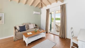 Junior Double or Twin Room, Sea View | Living area