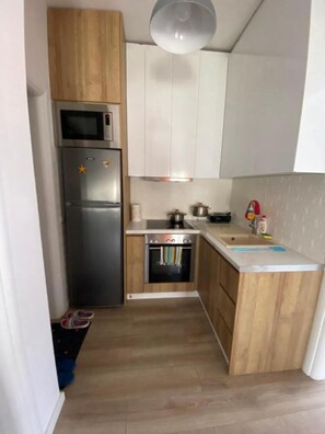 Apartamento, sacada, vista para o pátio | Cozinha privada
