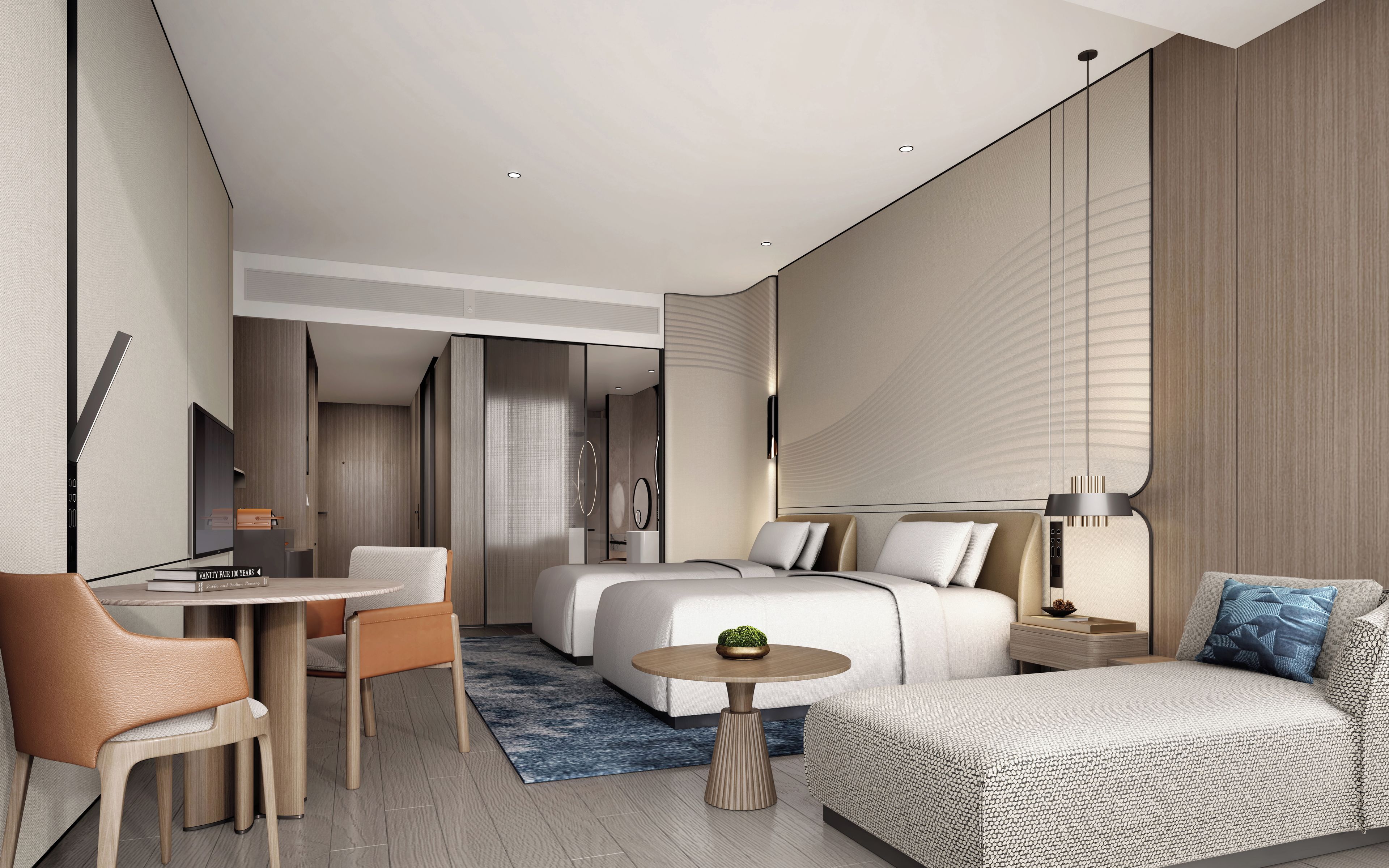 Una habitación de hotel moderna con una cama, un escritorio, una silla y una pequeña mesa.
