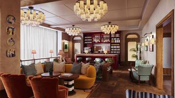 A hotel lobby with a bar area, seating arrangements, and decorative lighting.