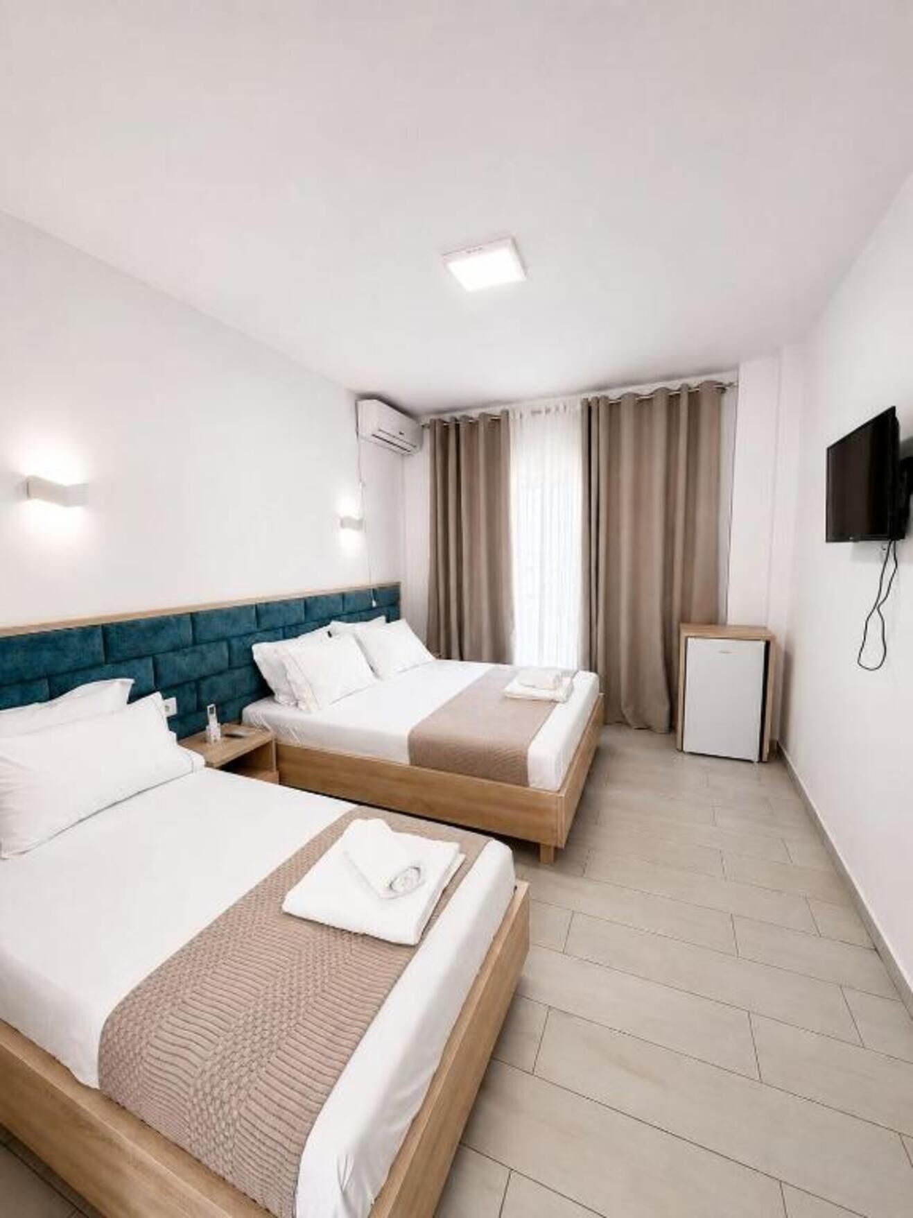Triple Room, Balcony | Desk, free WiFi