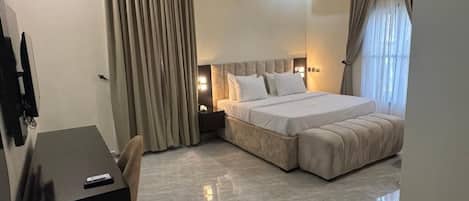 Junior Room, Balcony, City View | Desk, laptop workspace, blackout drapes, soundproofing