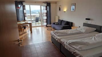 Apartment, Mountain View | Blackout curtains, iron/ironing board (on request), free WiFi