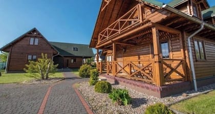Wooden holiday homes by the sea in Grzybowo in a quiet location.