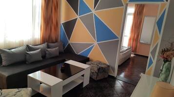 Suite, Balkon, Meerblick | Wohnbereich