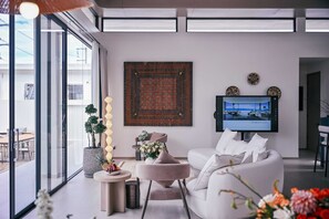 Villa Deluxe, vistas a la piscina | Zona de estar