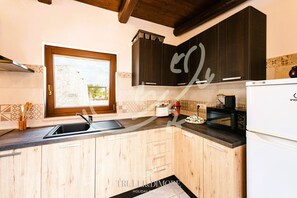 Interior - TD Truly Trulli Gentle Breezes Across Olive Va.. (Alberobello)