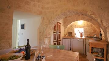 House (2 Bedrooms) | Private kitchen | Microwave, high chair
