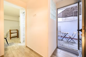 A corridor leading to a balcony with a view of a mountain. - (TET261I) 1 bedroom apartment in the center of Madrid (Madrid)