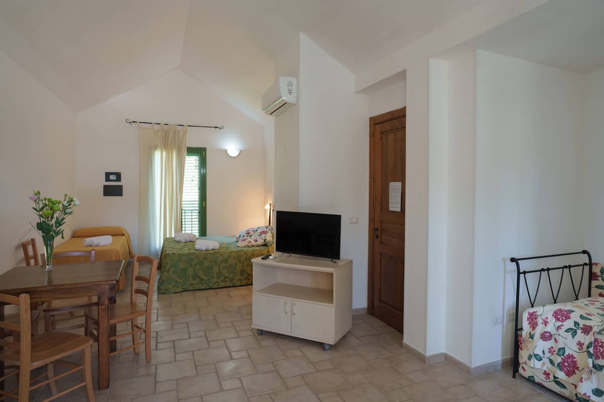 Chambre Triple Classique, vue piscine