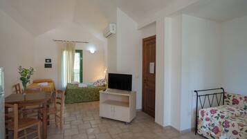 Classic Triple Room, Pool View | In-room safe, desk, free WiFi, wheelchair access
