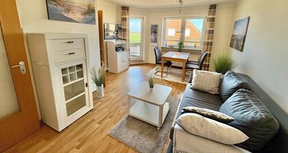 Behagliche Ferienwohnung an der Nordsee mit Balkon und inklusive Parkplatz