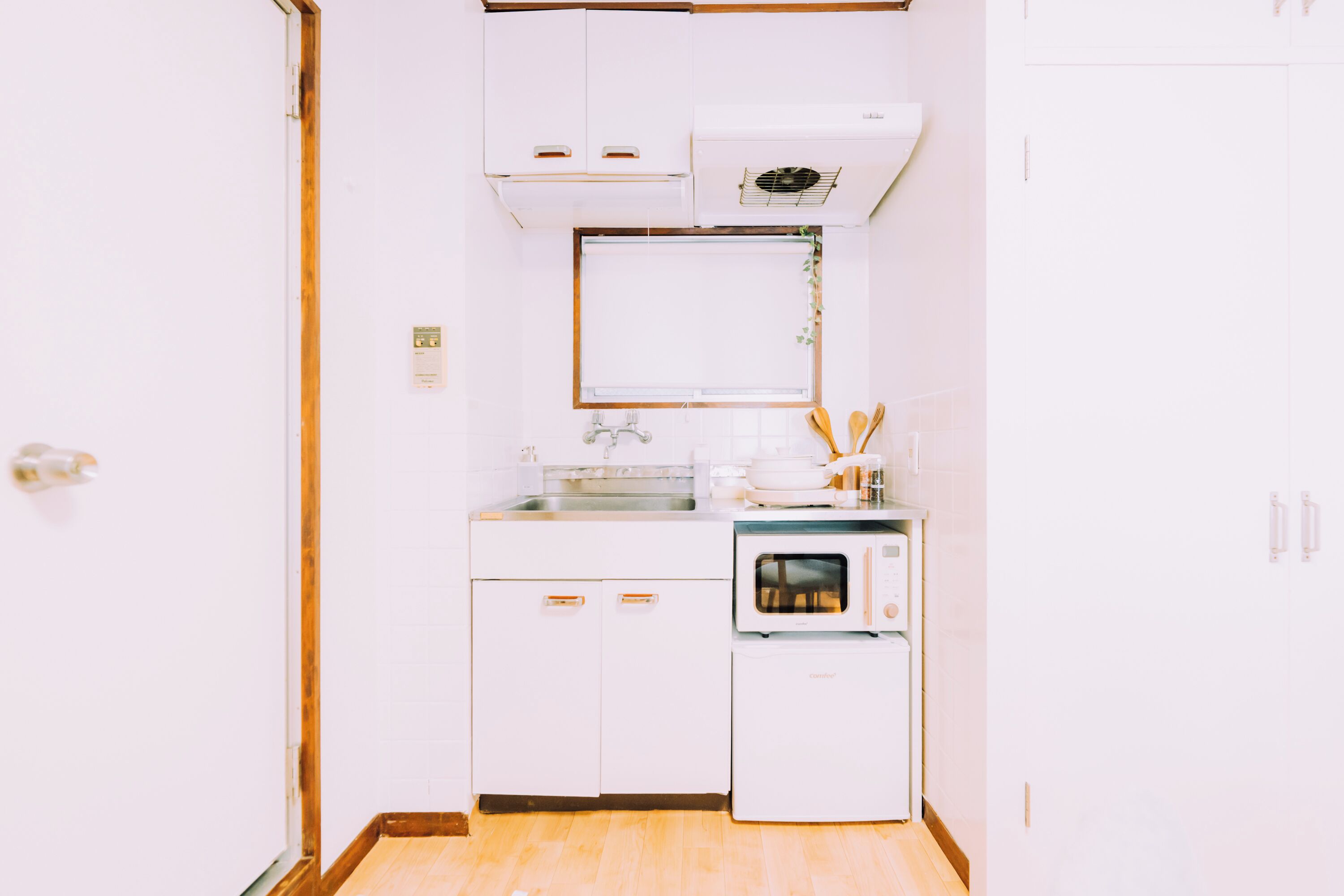 Apartment | Private kitchen | Mini-fridge, microwave, stovetop, cookware/dishes/utensils