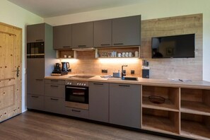 Apartment, Mountain View | Private kitchen | Full-size fridge, microwave, oven, stovetop - Aparthotel Stadler  (Flachau)