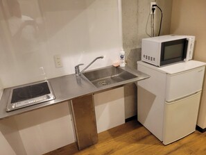 Full-size fridge, microwave, stovetop, cookware/dishes/utensils - New Normal Hotel in NAHA WAKASA (Wakasa, Naha City)