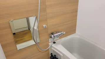 Twin Room | Bathroom | Combined shower/tub, hair dryer, slippers, towels