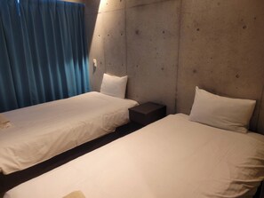 Twin Room | Blackout drapes, free WiFi - New Normal Hotel in NAHA WAKASA (Wakasa, Naha City)