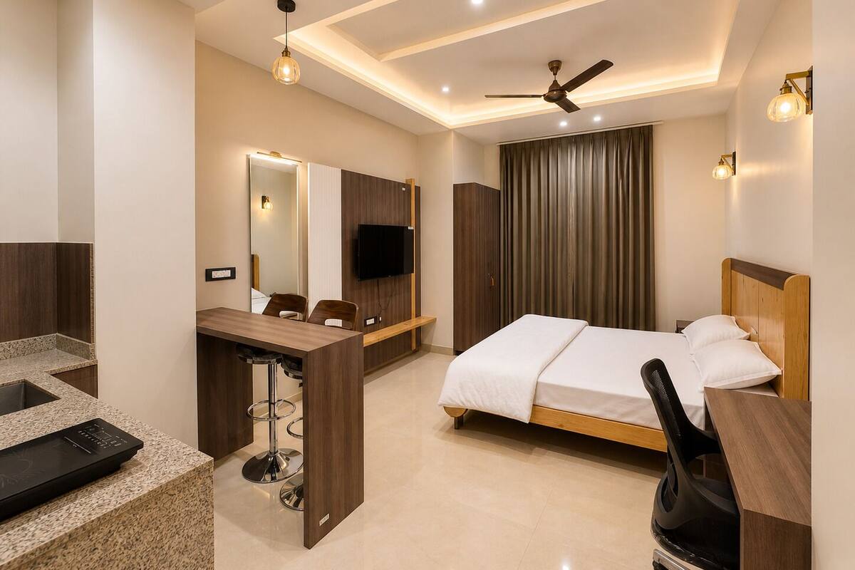 A modern hotel room with a bed, desk, chair, TV, ceiling fan, and a large window with curtains.
