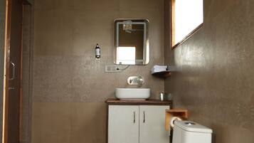 Eco-friendly toiletries, bidet, towels, soap