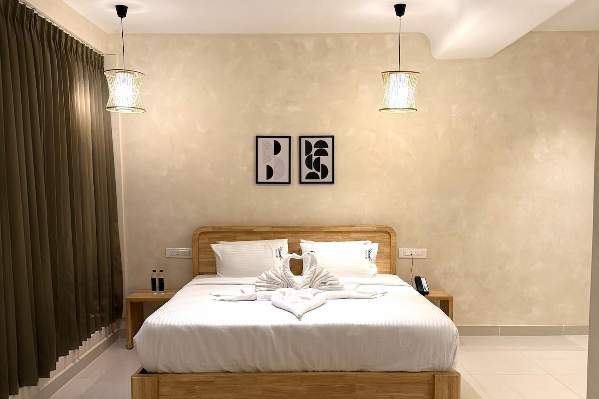 Kamar Standar | Seprai premium, selimut bulu angsa, busa memori, dan minibar