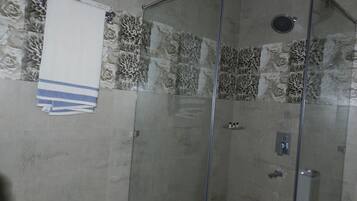 Shower, free toiletries, towels, soap