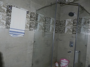 Shower, free toiletries, towels, soap