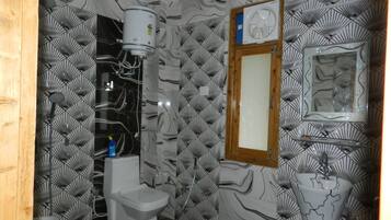 Shower, free toiletries, towels, soap