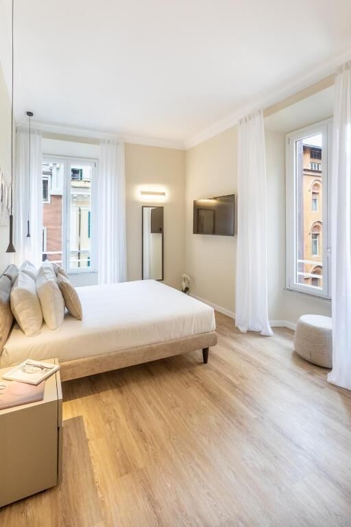 Deluxe-Doppelzimmer, Stadtblick | Zimmersafe, Verdunkelungsvorhänge, schallisolierte Zimmer