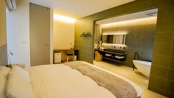 Premium bedding, down duvets, pillow-top beds, free minibar