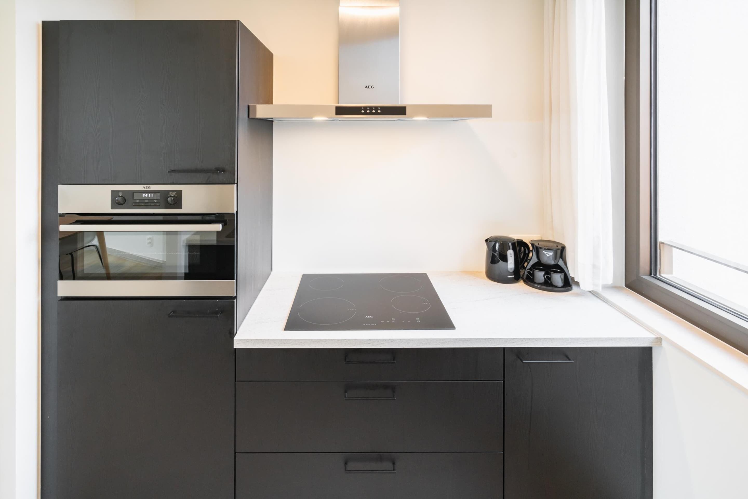 Appartement Deluxe, 3 chambres | Cuisine privée | Réfrigérateur, micro-ondes, four, plaque de cuisson