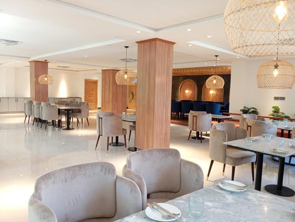 Family Quadruple Room, City View | Dining