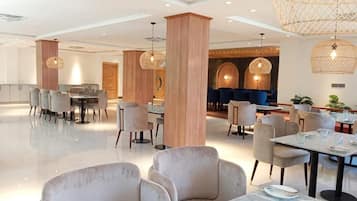 Family Quadruple Room, City View | Dining