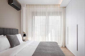 Deluxe Apartment, Balcony | Egyptian cotton sheets, premium bedding, down comforters
