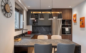 Deluxe Apartment, Balcony | Private kitchen | Espresso maker, coffee/tea maker, full-size fridge, microwave