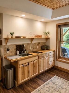 Private kitchen -     Whispering Pines Cozy Cabin Suite Retreat Near Jordan Lake and Pet Friendly (New Hill)