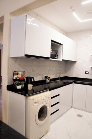 Private kitchen - Tremendous 3-bedroom apartment with AC & Fast Wi-Fi in New Cairo City (New Cairo City)