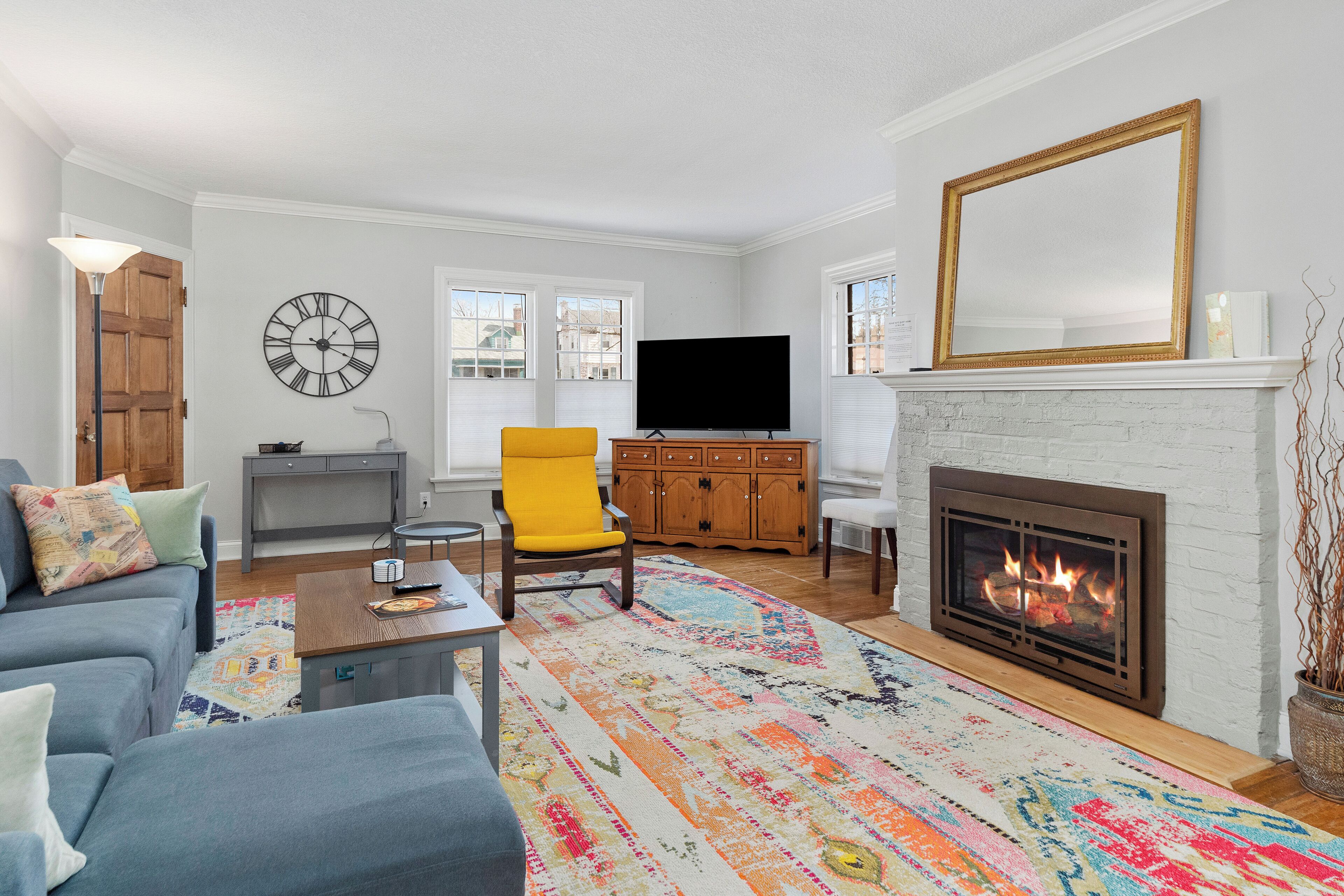 Smart TV, fireplace, books