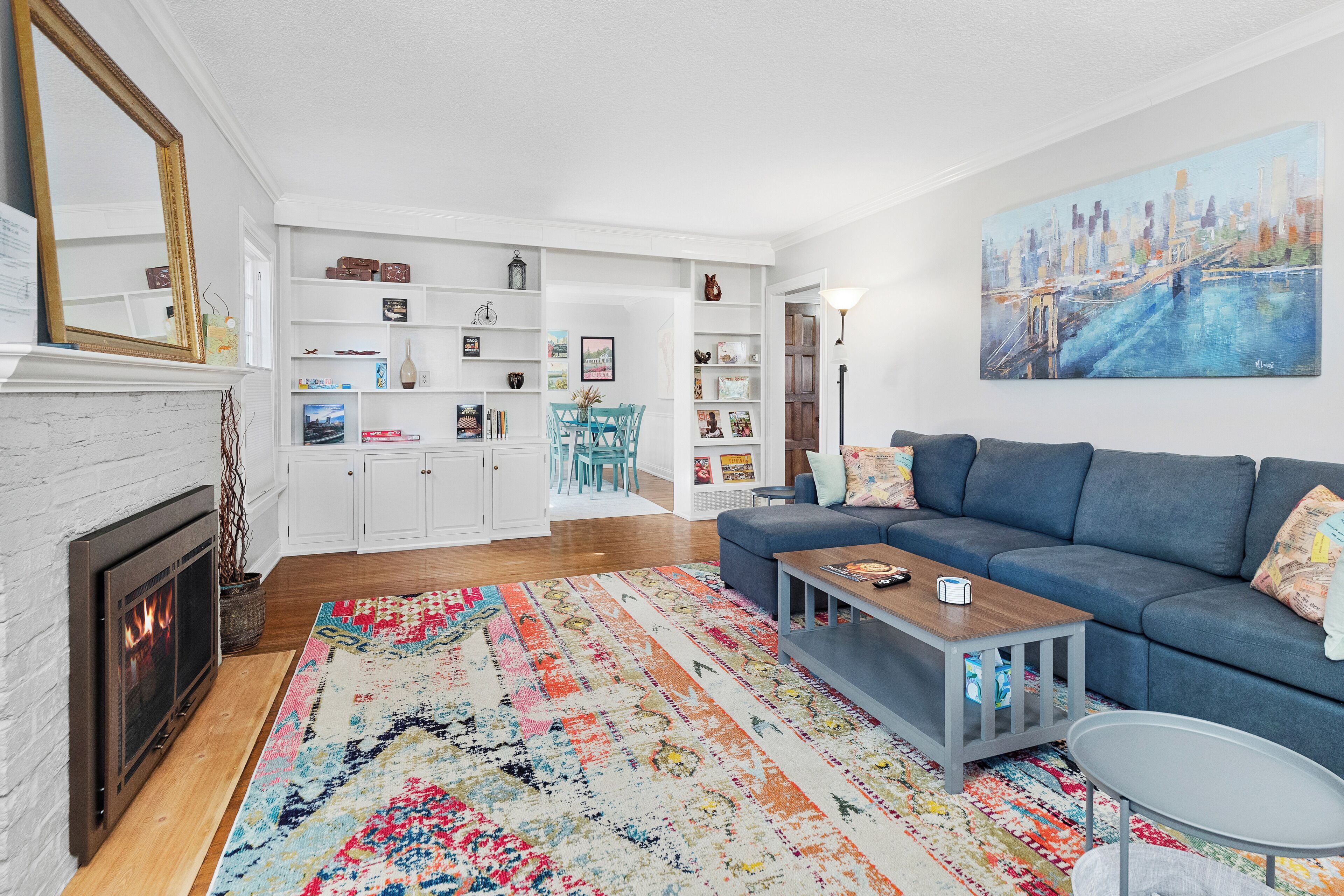 Smart TV, fireplace, books