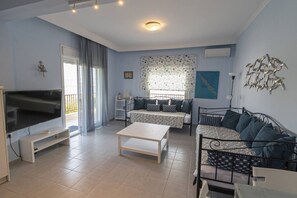 TV - Sandra Seafront Apartment by RentalsPro - Moudania Halkidiki (Nea Moudania)