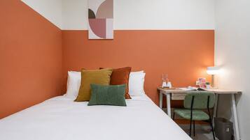 Desk, laptop workspace, free WiFi, bed sheets