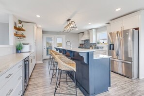 Fridge, microwave, stovetop, dishwasher - The Crooked Palm | Luxury Coastal Escape w/ Pool & Views | Steps to the Beach (Oak Island)