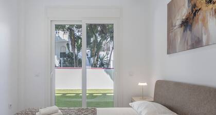 Apartment 'Los Drogos Bajo B' with shared pool, garden, and Wi-Fi