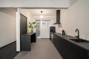 Apartment | Private kitchen - Elegant 2-bedroom Stay in Central Antwerp (Antwerp)