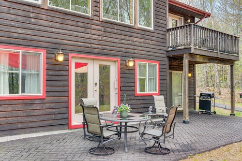 Fire Pit & Forest Views: Lakes Region Retreat