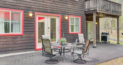Fire Pit & Forest Views: Lakes Region Retreat